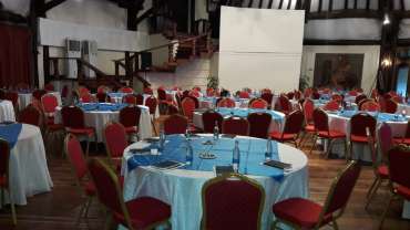 A successful conference is a symphony of moving parts. Without a conductor who understands the score, the message gets lost in the noise.